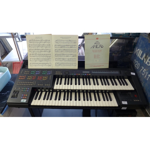 2128 - Yamaha Electone H58 keyboard with floppy discs & stool