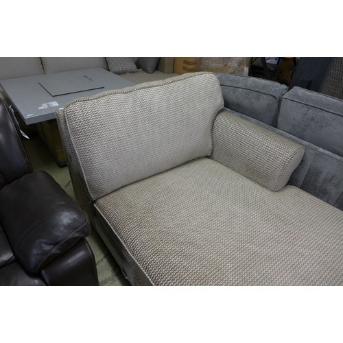 1631 - An oatmeal upholstered chaise section