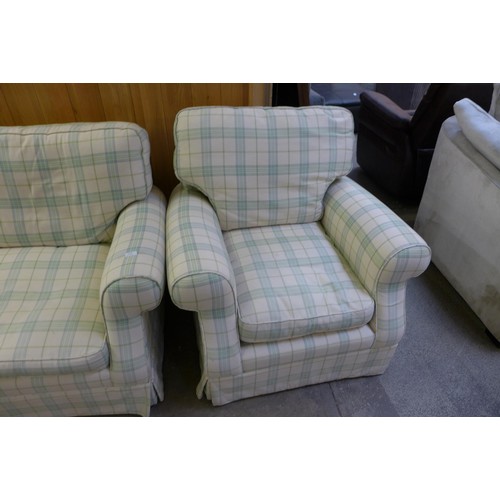 1638 - An off white and green plaid three seater sofa and armchair