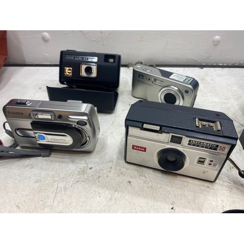 2230 - Compact camera job lot: original Kodak A1 110 film camera; Fuji Finepix A330 digital compact, 1960's... 