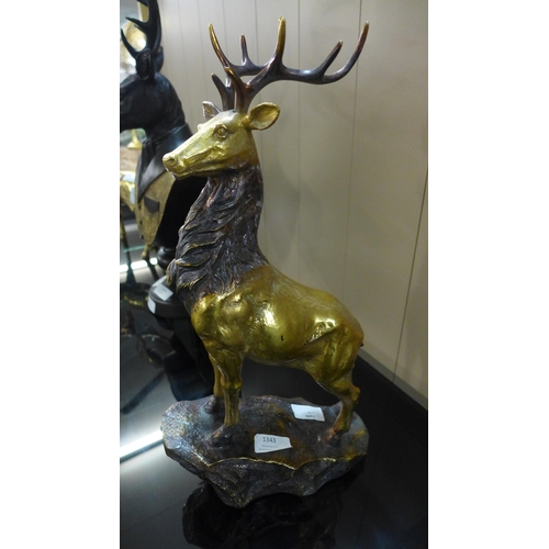 1343 - A large gold standing stag, H 17cms (2230724)   #