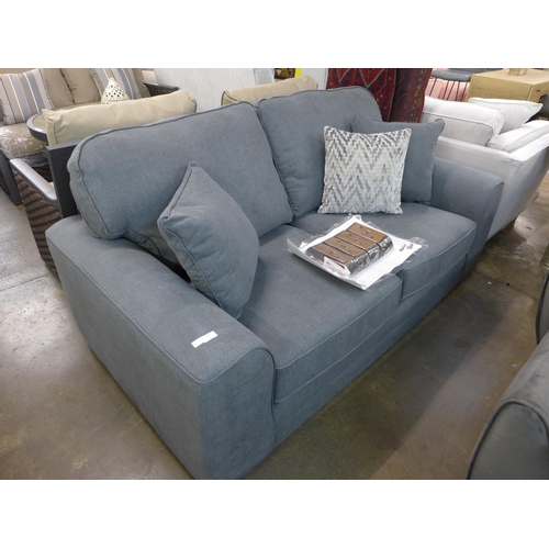 1450 - A grey upholstered three seater sofa