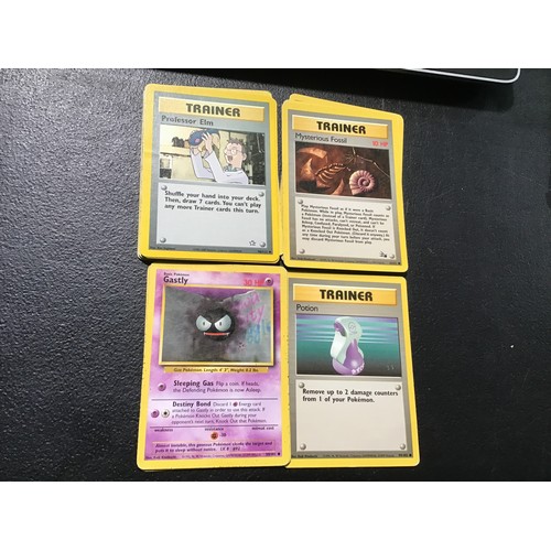 2213 - Pokemon cards and smurf figures