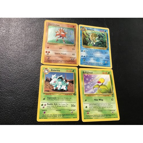 2213 - Pokemon cards and smurf figures