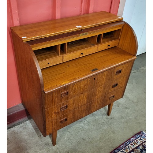 21 - A Swedish S.M.I. teak cylinder bureau, designed by Egon Ostergaard