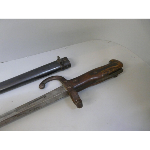 828 - A French bayonet with scabbard