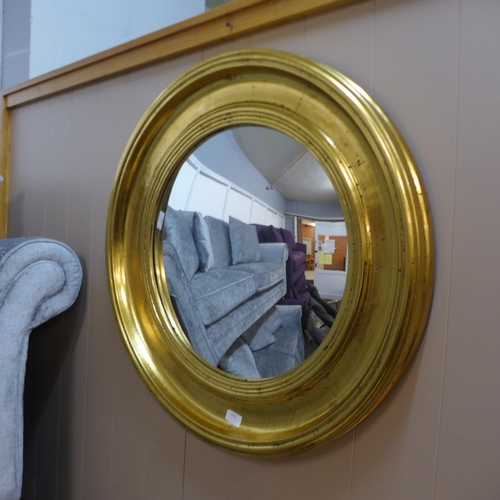 1303 - A large gold convex mirror, 74cms (M11555)   #