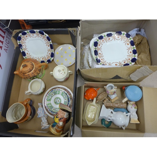 1251 - A box of decorative plates including Clarice Cliff, Wedgwood and a box of mixed china, Toby jug, Cot... 