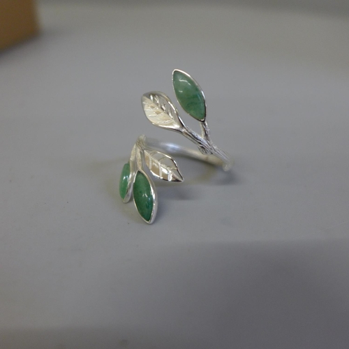 627 - Seven sterling silver leaf open rings, new