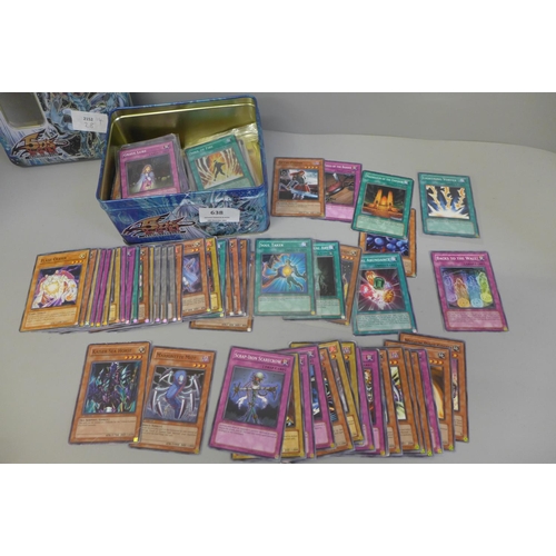 638 - A tin of Yu-Gi-Oh cards including first edition