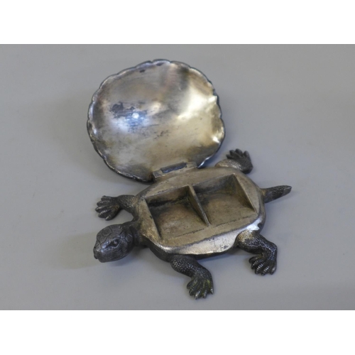 645 - A stamp holder in the form of a tortoise