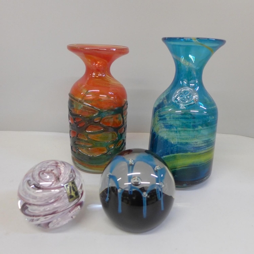 673 - Two Mdina glass vases, a Caithness paperweight and a Langham glass paperweight