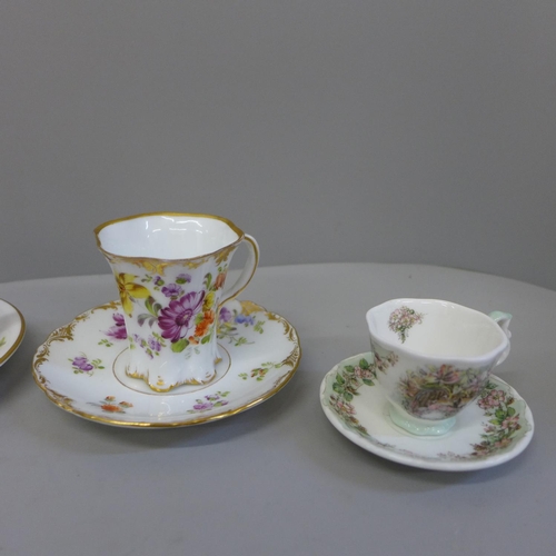 699A - A collection of cups and saucers including Limoges, Dresden and Paragon