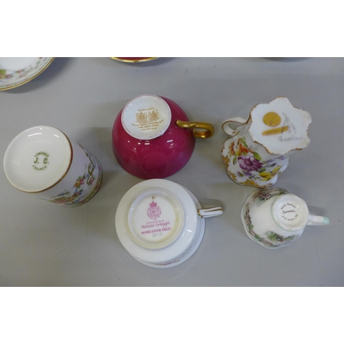 699A - A collection of cups and saucers including Limoges, Dresden and Paragon