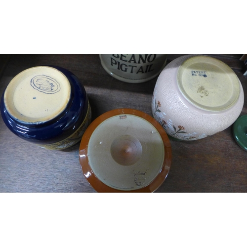 707 - Three Langley pottery jars and a Langley match holder