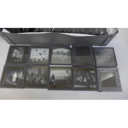 717 - A collection of magic lantern slides from 1920's/1930's; Landmarks and Family Life, etc.