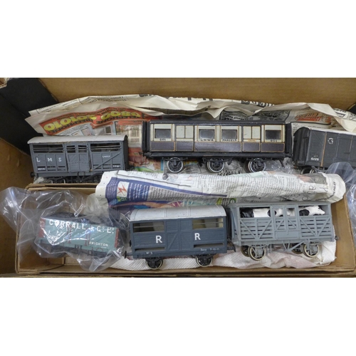 734 - A collection of vintage 0 gauge rolling stock, ten wagons