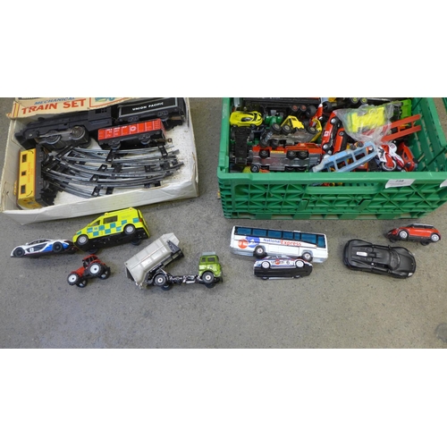 738 - Die-cast model vehicles and a train set