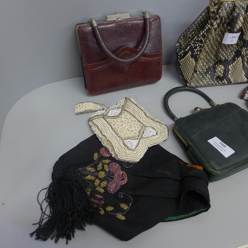 766 - Three Victorian leather handbags, two Victorian beadwork handbags and a vintage handbag