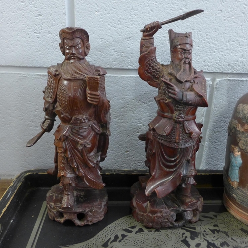 807 - Two carved wooden warrior figures, a dragon decorated tray and a Japanese style vase