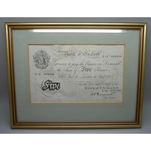 825 - A framed Five Pounds bank note, KO Peppiatt Chief Cashier