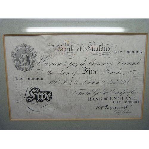 825 - A framed Five Pounds bank note, KO Peppiatt Chief Cashier