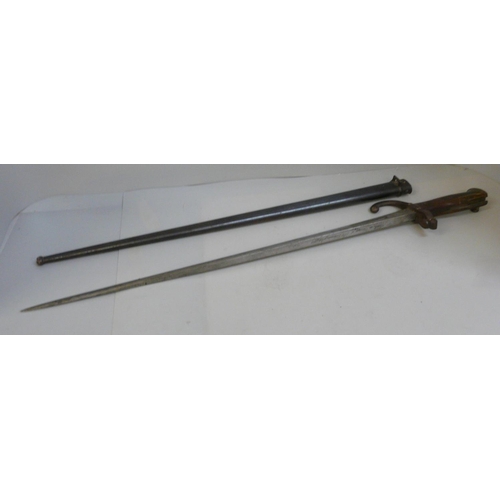 828 - A French bayonet with scabbard