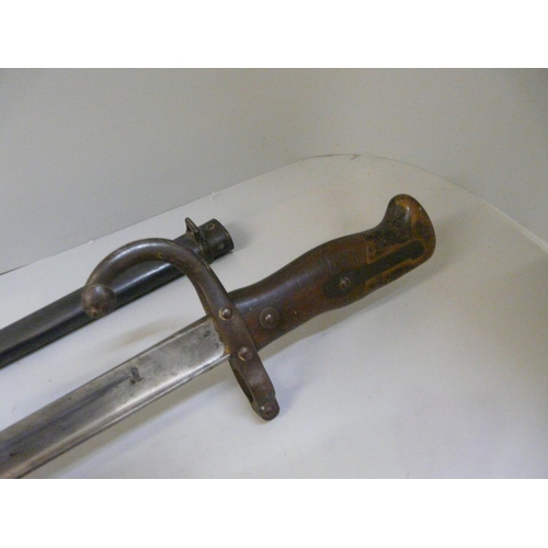 828 - A French bayonet with scabbard