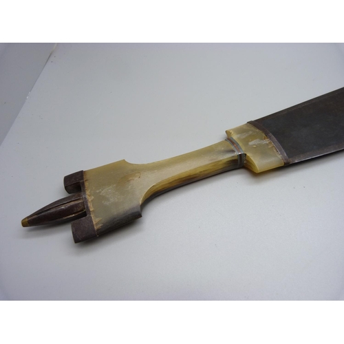 830 - A knife with carved horn handle