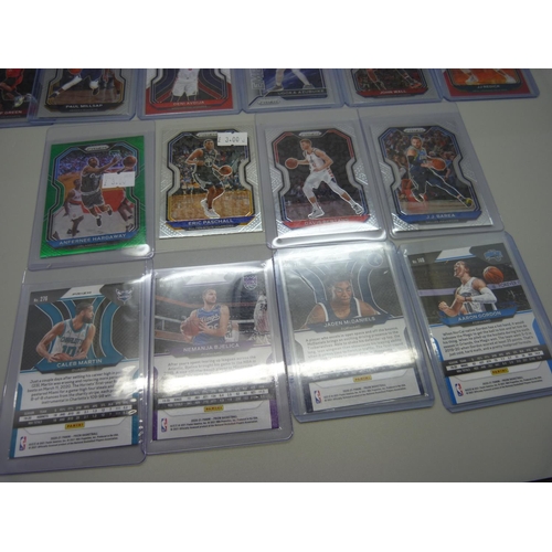 834 - Fourteen Holo Panini Prizm basketball cards including Jaden McDaniels in protective sleeves