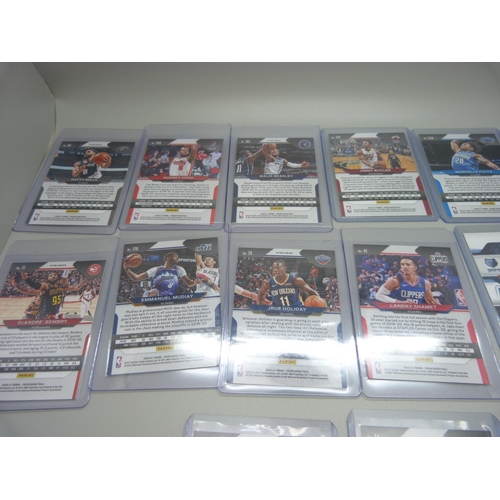 835 - Fifteen Holo Panini Prizm basketball cards including Patty Mills in protective sleeves