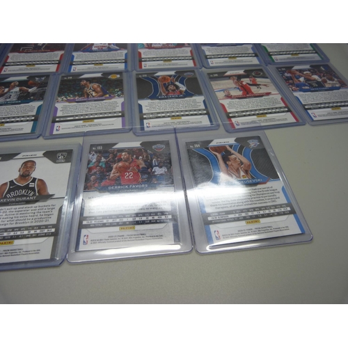 836 - Fifteen holo Panini Prizm basketball cards including Alexsej Pokusevski in protective sleeves