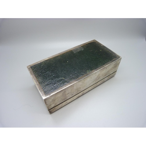 850 - A silver cigarette box with wood lining, gross weight 488g