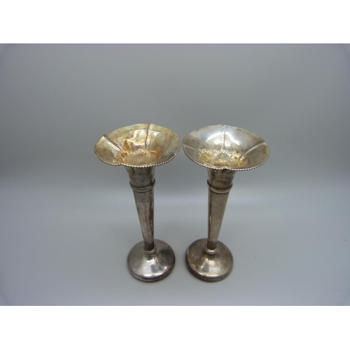 854 - A pair of silver posy vases with weighted bases, 12.5cm, 110g gross weight