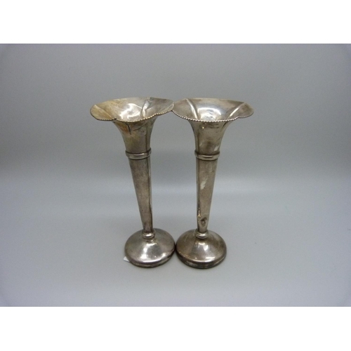 854 - A pair of silver posy vases with weighted bases, 12.5cm, 110g gross weight