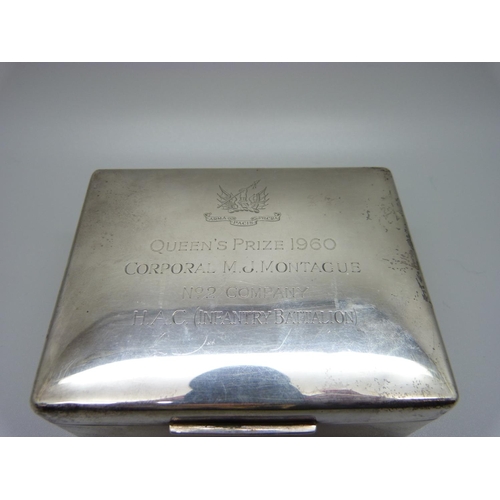 857 - A silver cigarette box with wood lining, Regimental Prize inscription to the lid, 303g gross weight