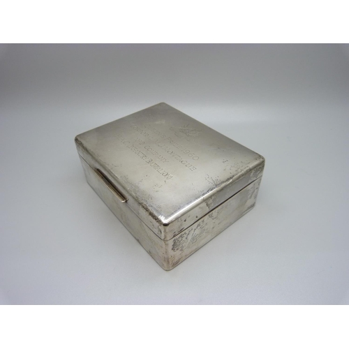 857 - A silver cigarette box with wood lining, Regimental Prize inscription to the lid, 303g gross weight