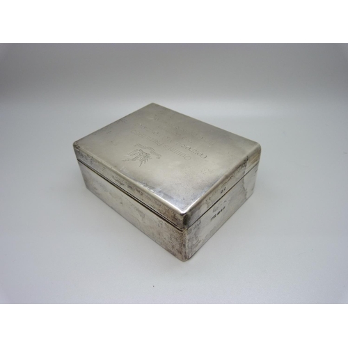 857 - A silver cigarette box with wood lining, Regimental Prize inscription to the lid, 303g gross weight