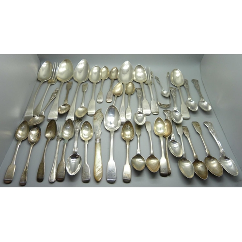 858 - A collection of silver flatware, 1302g