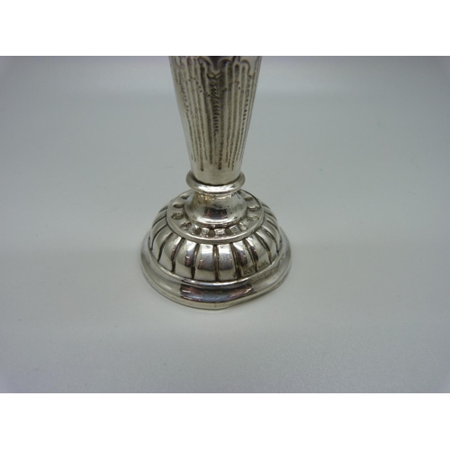 859 - An embossed silver vase with weighted base, London 1888, William Comyns maker, 15.3cm 169g