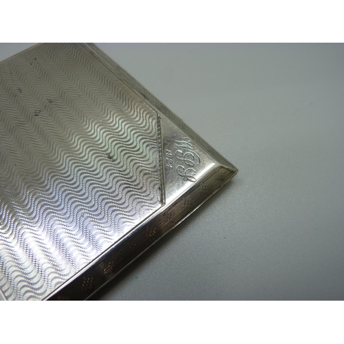 864 - A silver cigarette case, 120g