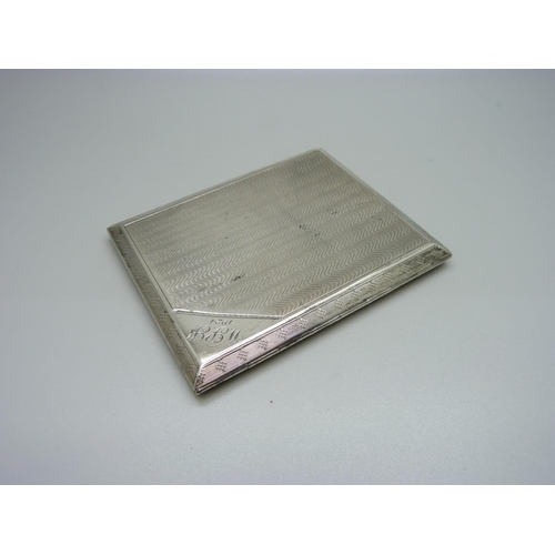 864 - A silver cigarette case, 120g