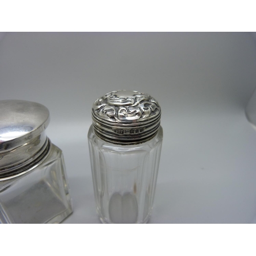 871 - Two silver topped bottles and a silver topped jar