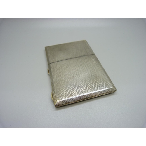 876 - A silver cigarette case with silver gilt interior, 163g