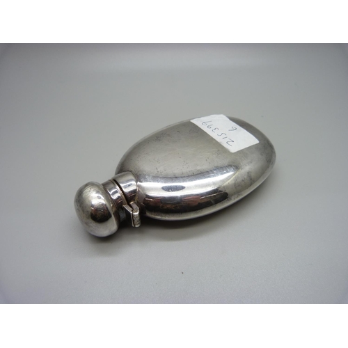 879 - A silver hip flask, 106g