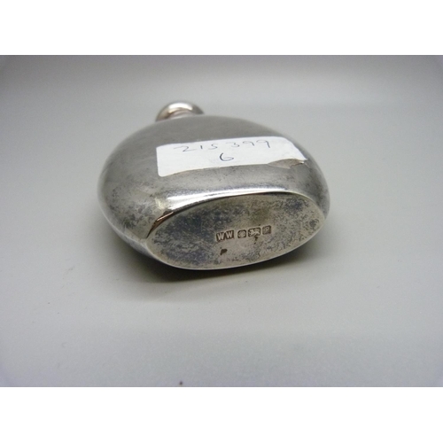 879 - A silver hip flask, 106g