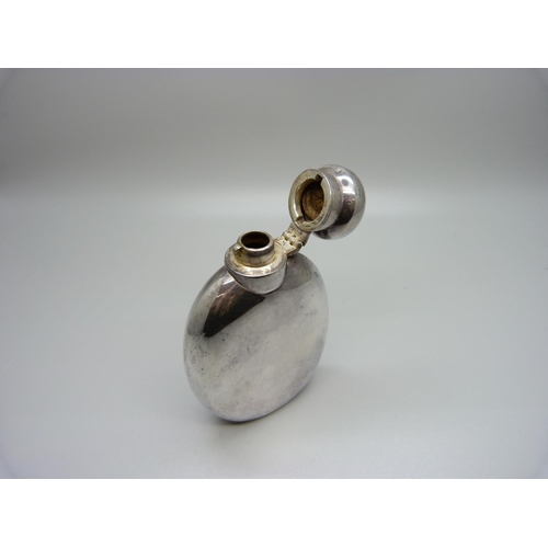 879 - A silver hip flask, 106g