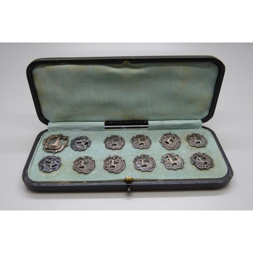 890 - A set of eleven silver buttons, Birmingham 1901, and one similar larger silver buttons, 23g