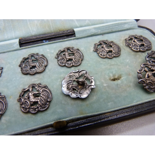 890 - A set of eleven silver buttons, Birmingham 1901, and one similar larger silver buttons, 23g