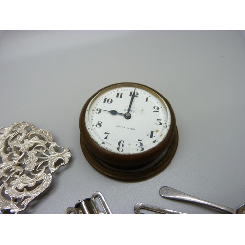 893 - Thimbles, an 8 day clock, buckles, a fob, etc.